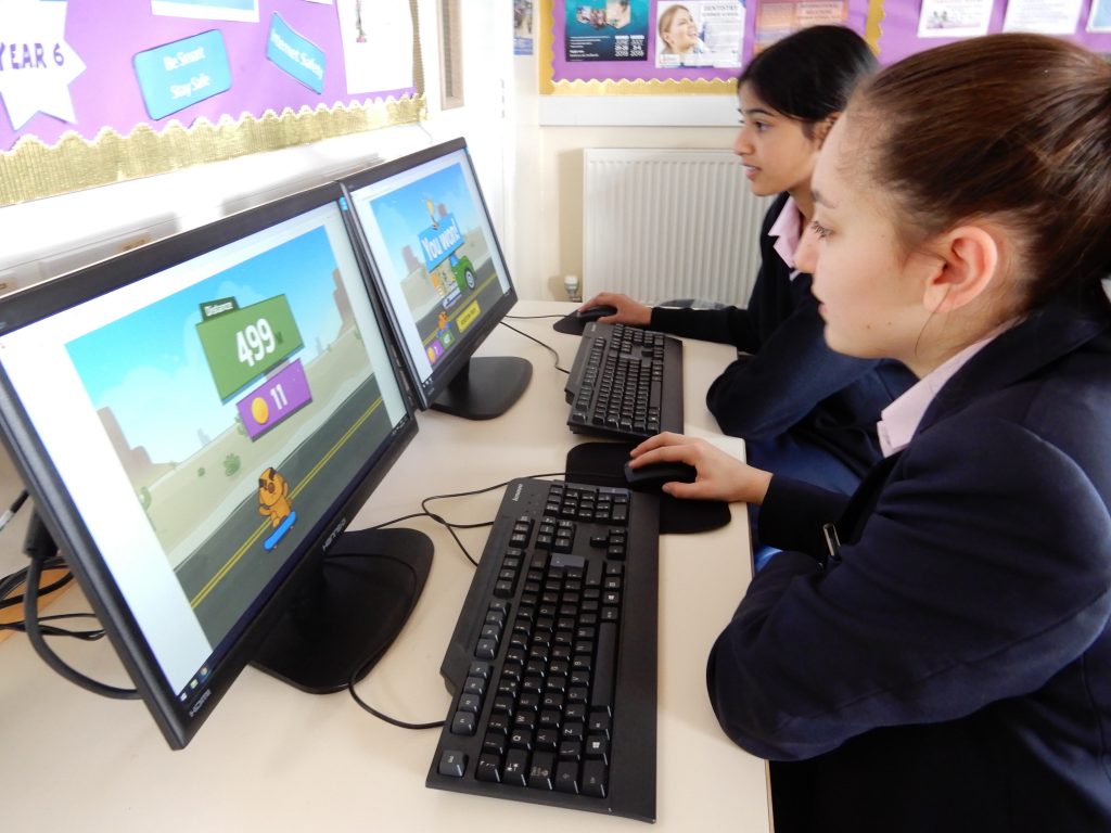 students working in the computer room