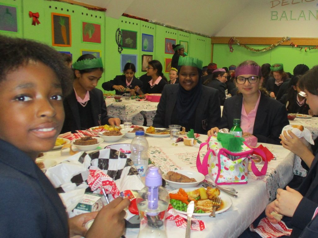 students eating Christmas dinner