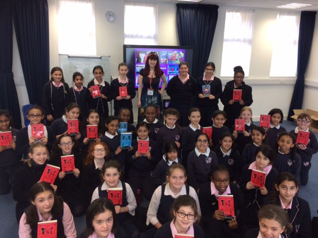 Students holding books