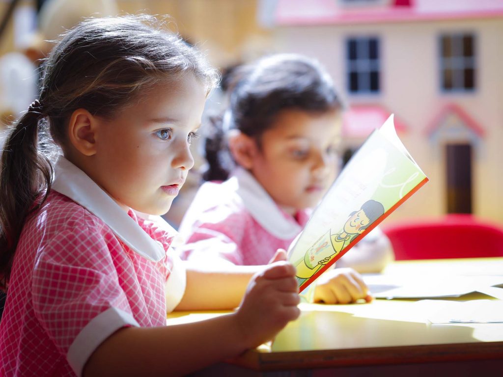 little girl reading