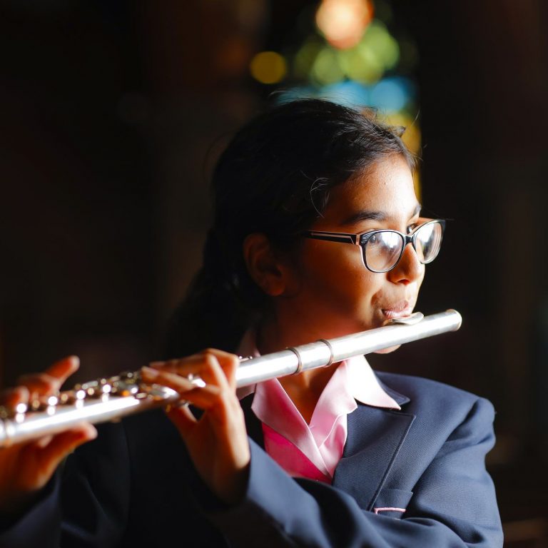 girl playing the flute