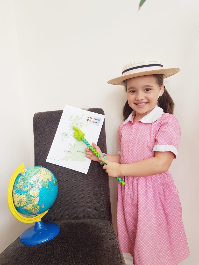 child pointing at the weather