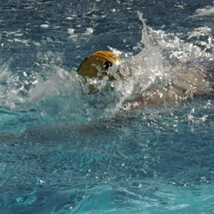 student swimming