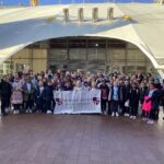 Students holding a banner