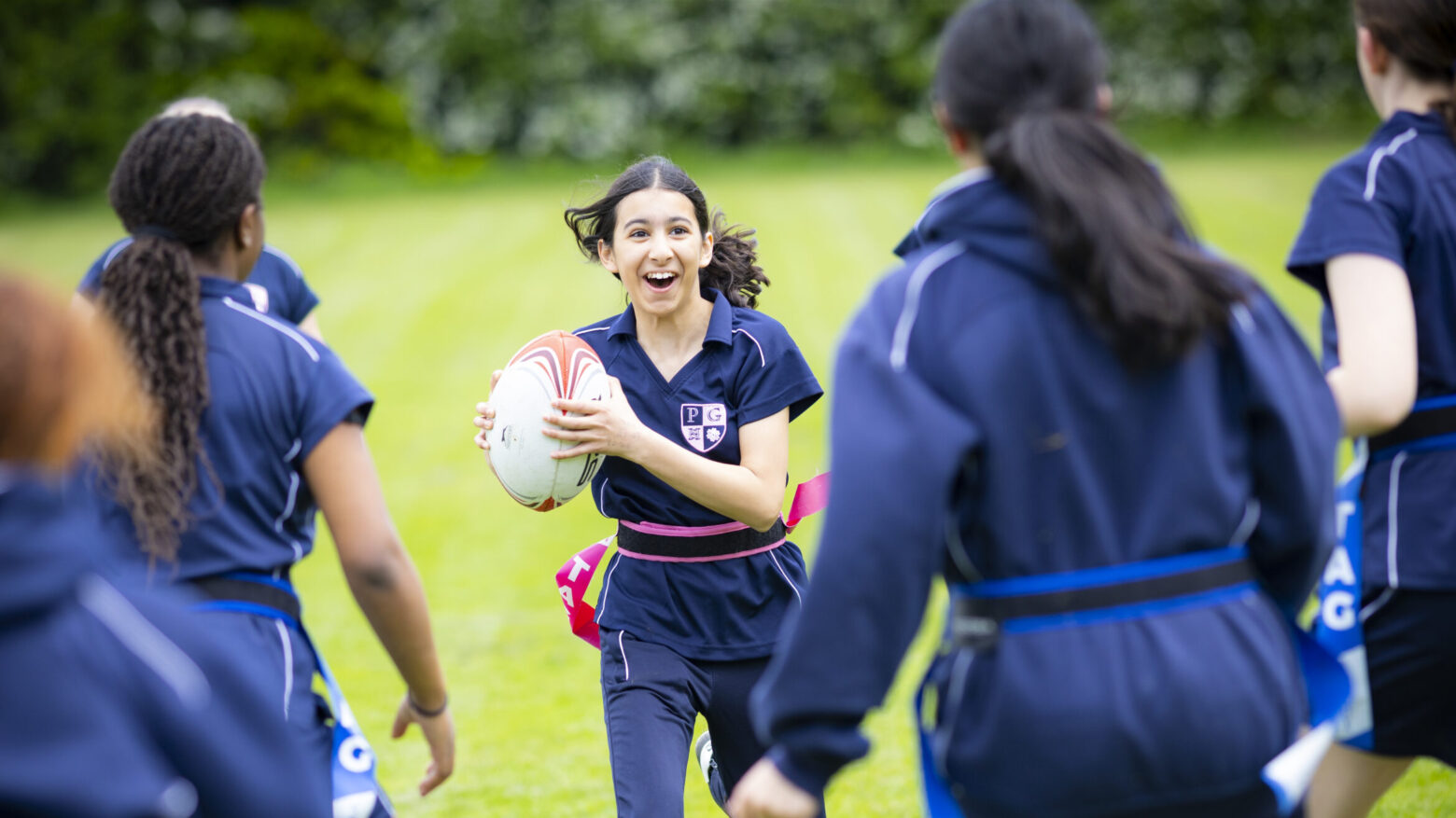 girls playing rugby