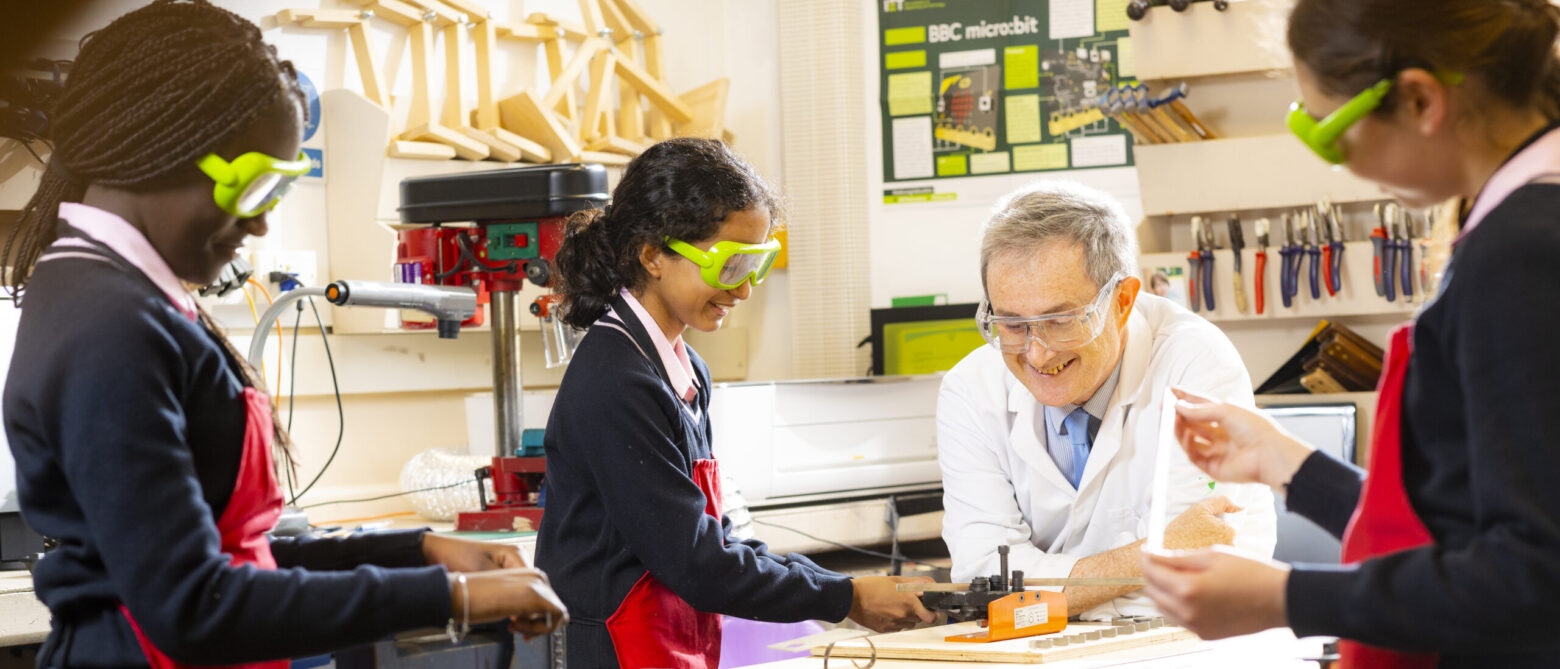 children performing a science experiment