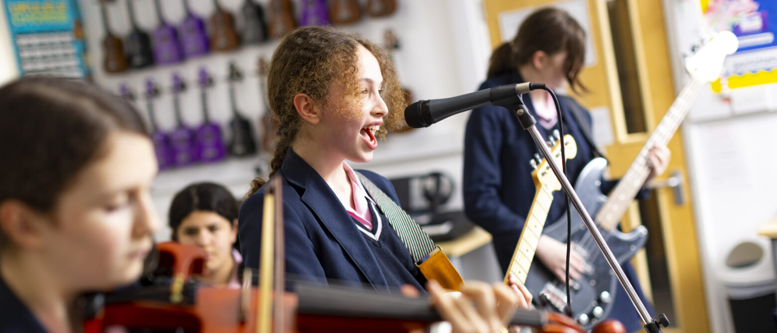 girls in a music lesson