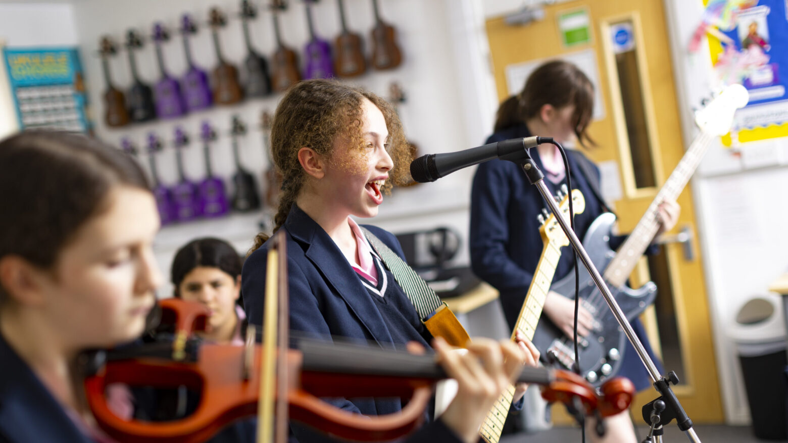 girls in a music lesson