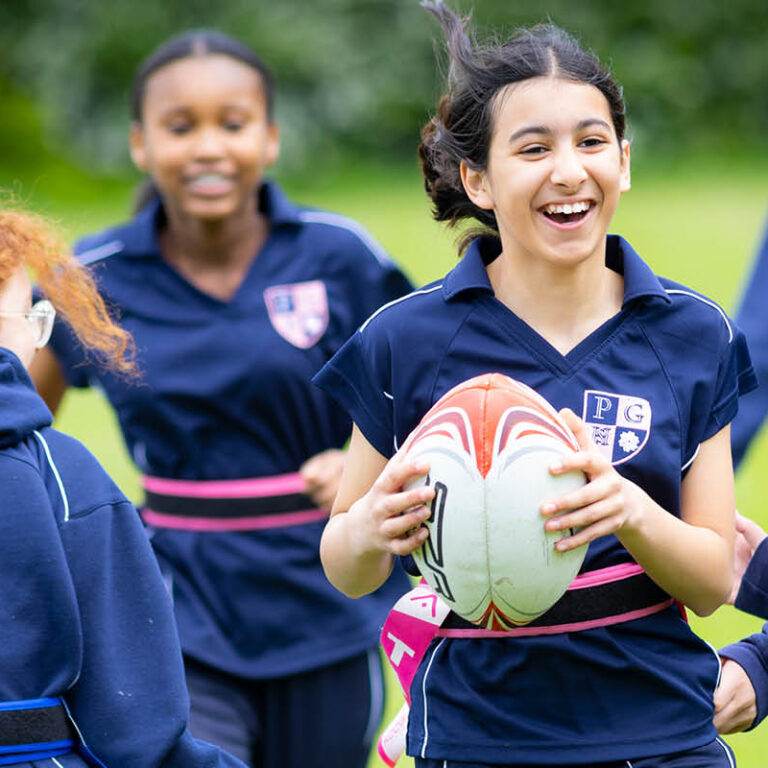 girls playing rugby