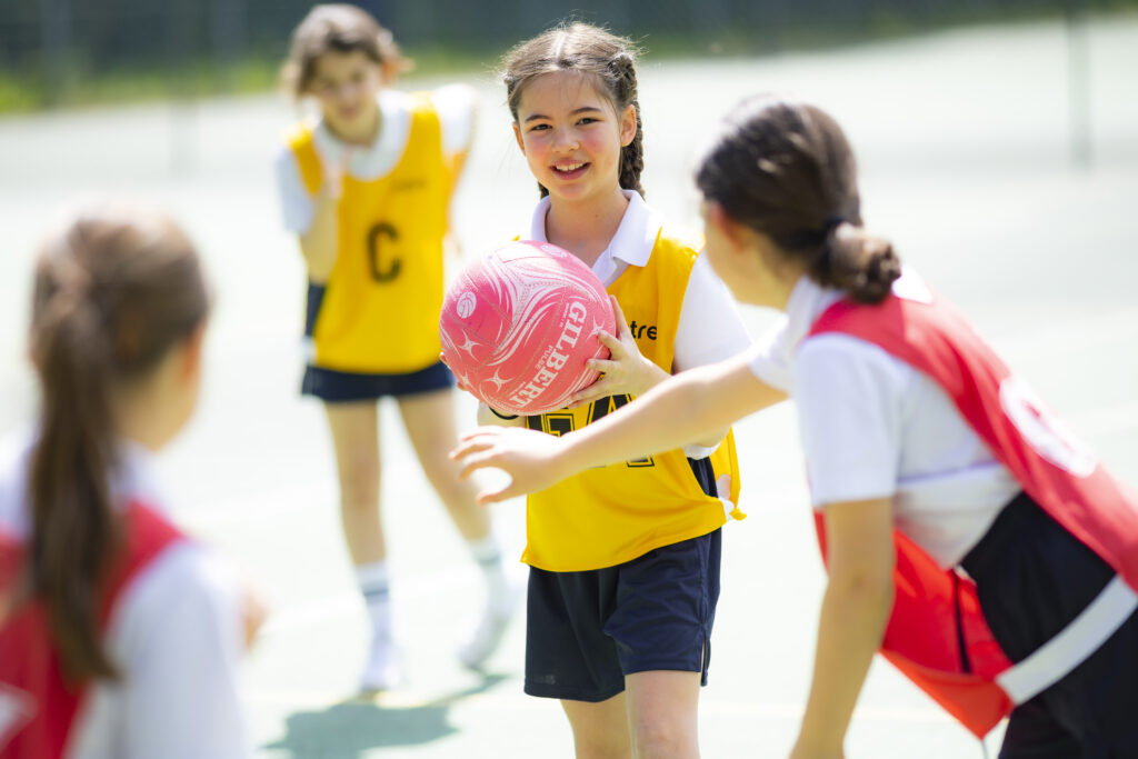 students playing netball