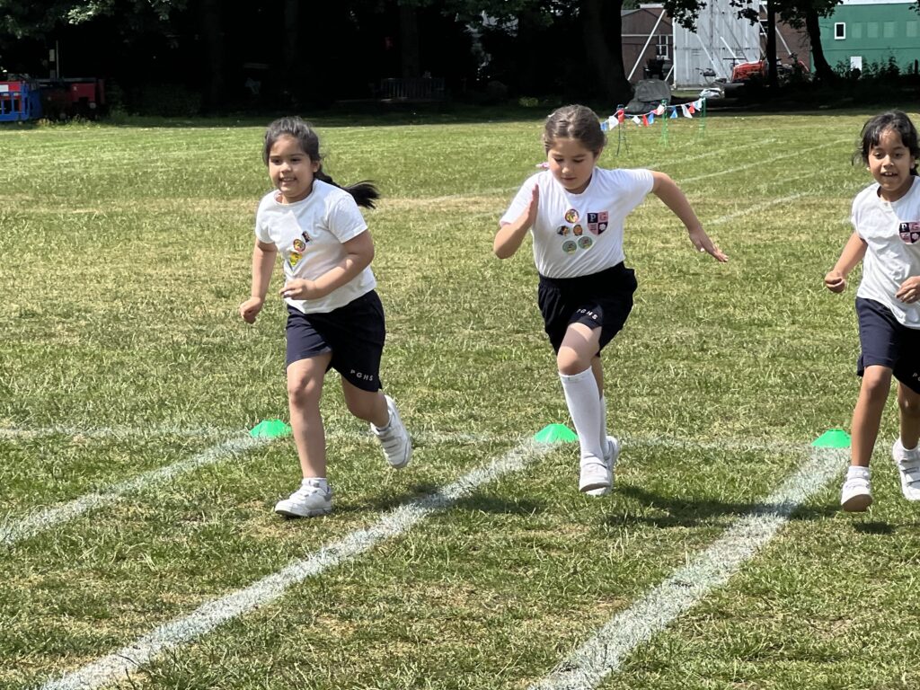 students running along the field