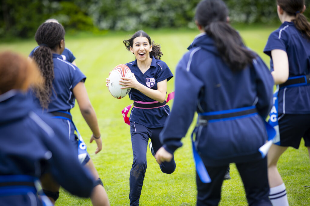 students playing rugby