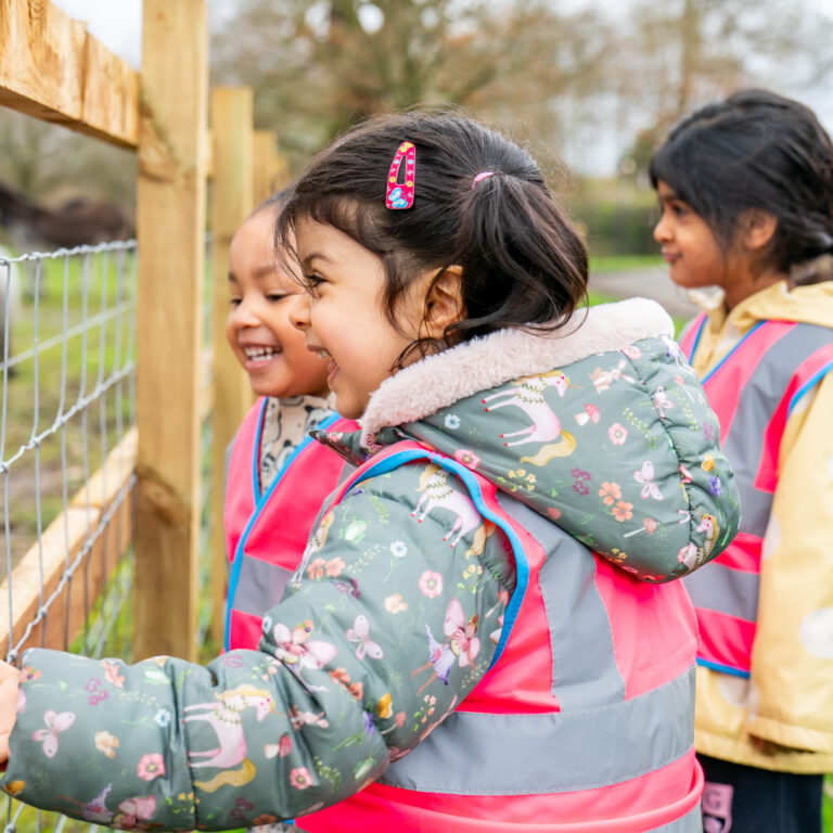 nursery girls looking at animals