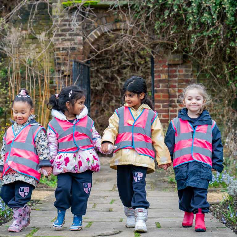 nursery girls walking hand in hand